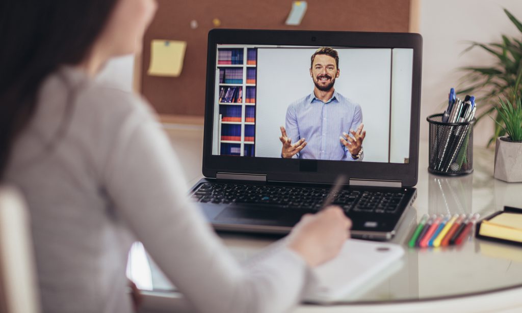Woman watching a webinar